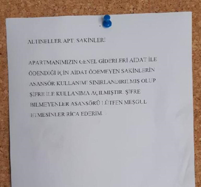Aidat Ödemeyen Komşuya �Şifreli Asansör� Şoku